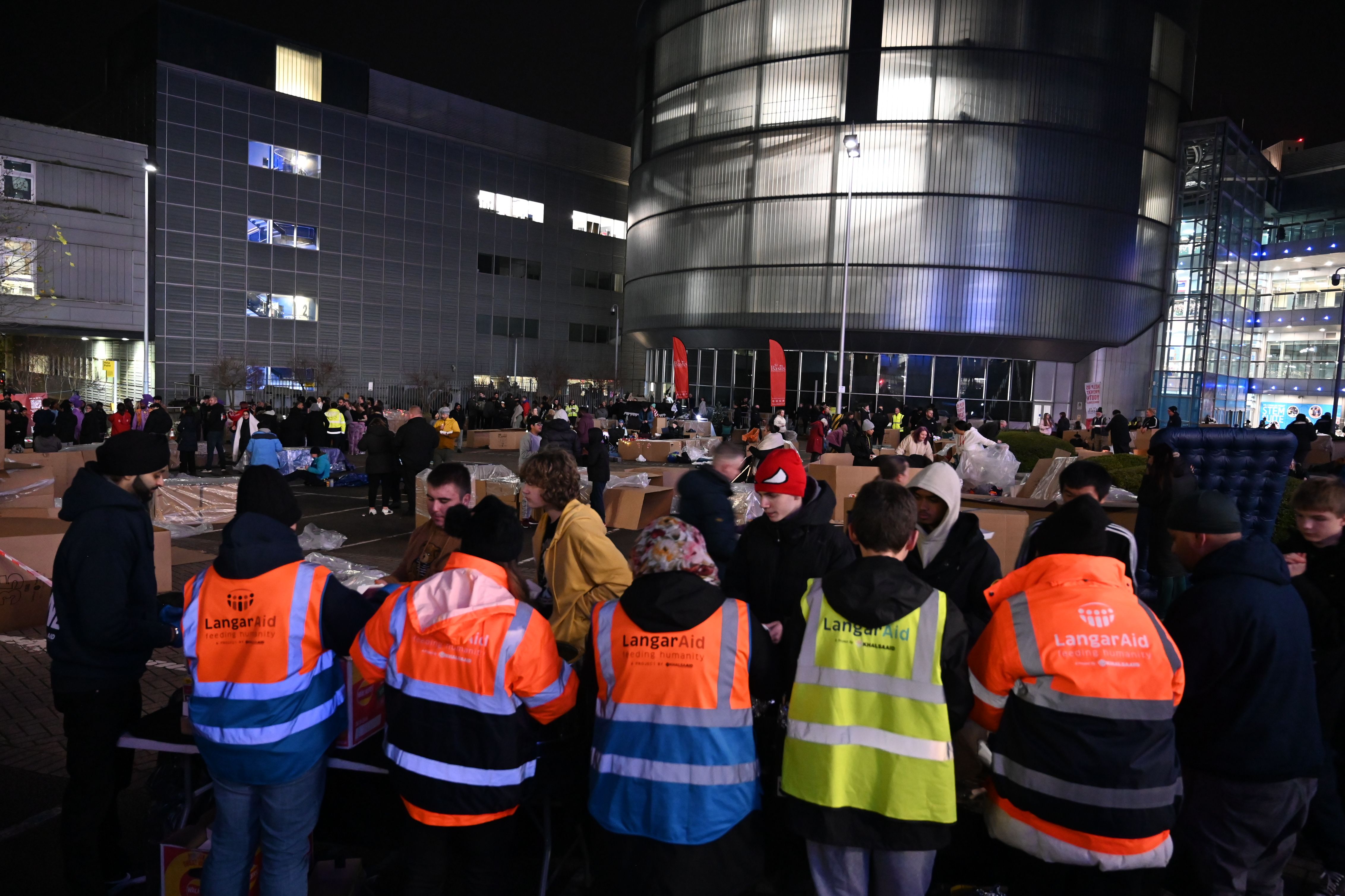 Langar Aid team at St Basils Sleepout serving hot meals in Birmingham